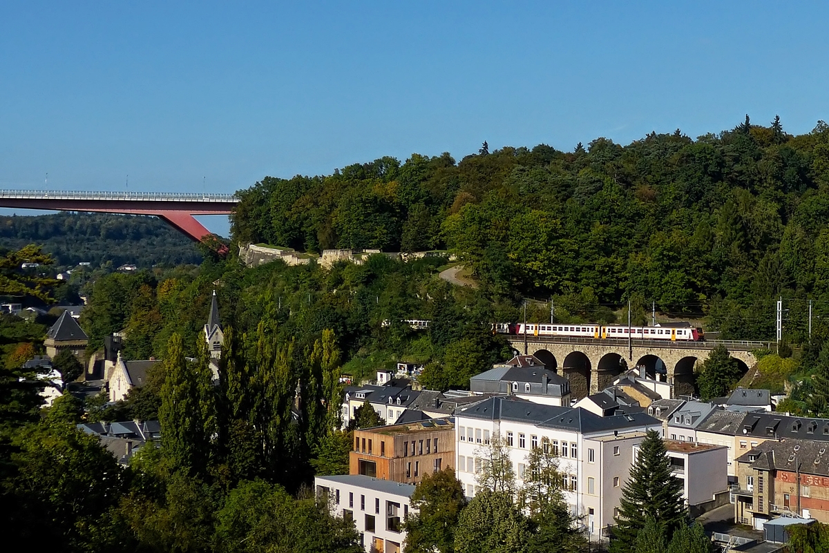. The RB 3215 Luxembourg City - Wiltz is running in the Grnewald viaduct in Luxembourg City on September 23rd, 2014.
