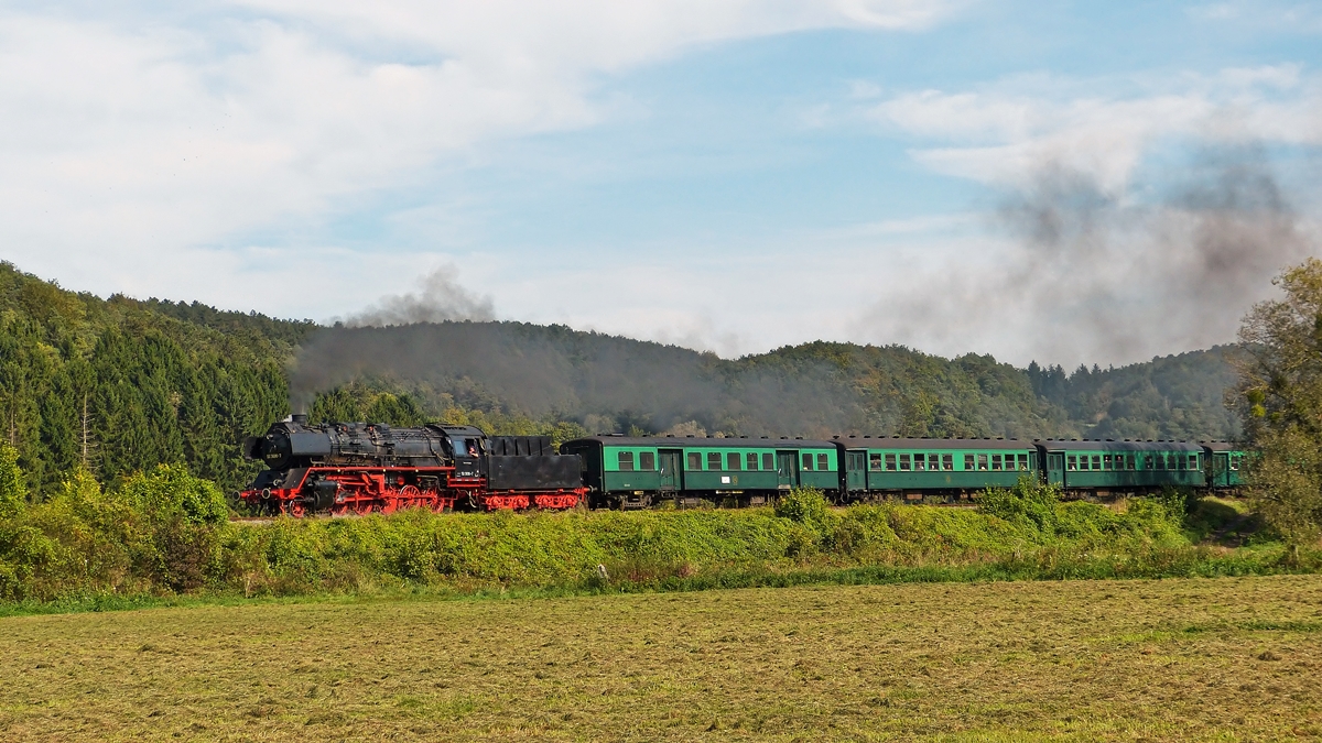 . The steam locomotive 50 3696-7 is hauling its heritage train on the track of the heritage railway CFV3V (Chemin de Fer  Vapeur des 3 Valles) near Vierves-sur-Viroin on September 28th, 2014.