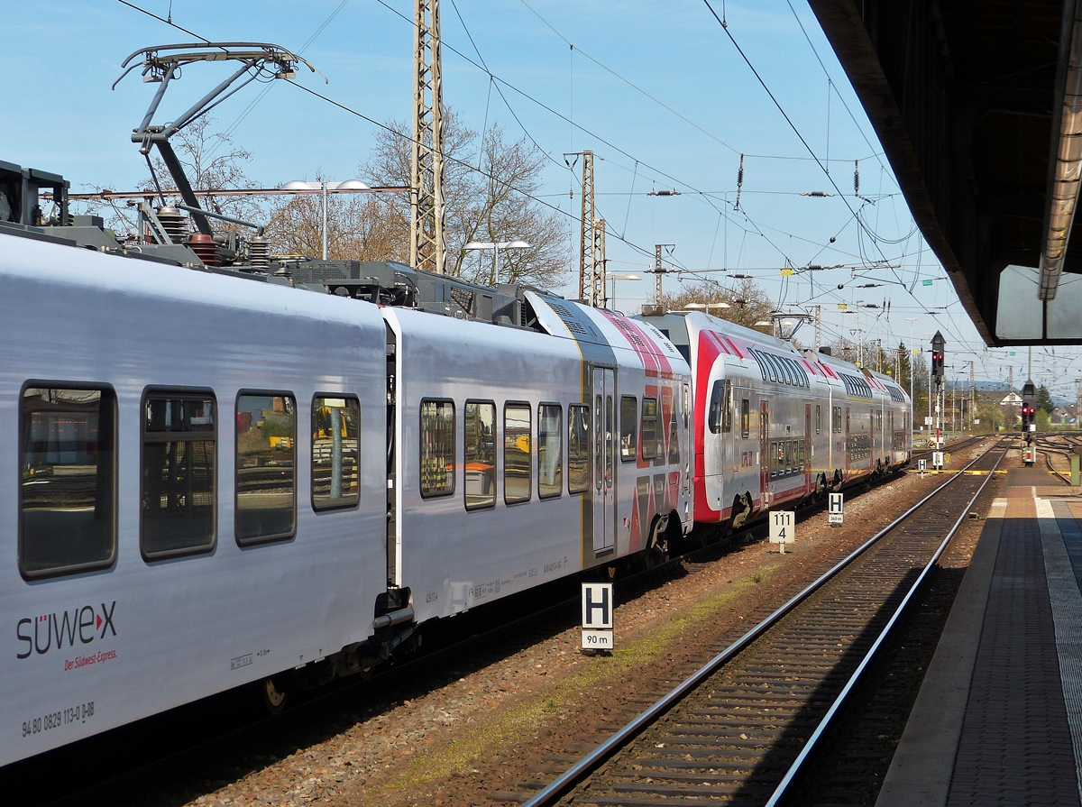 . The SWEX 429 113-4 and the CFL KISS 2306 are entering as RE 5114 from Koblenz into the main station of Trier on April 10th, 2015.