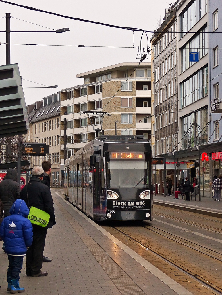 . Tram N 0758 is arriving at the stop Rathaus in Braunschweig on January 3rd, 2015.