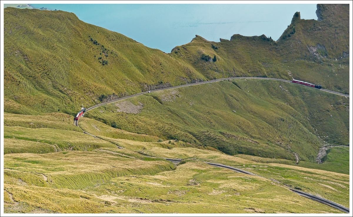 . Two steam trains are descending the BRB track between Rothorn Kulm and Oberstafel on September 28th, 2013.