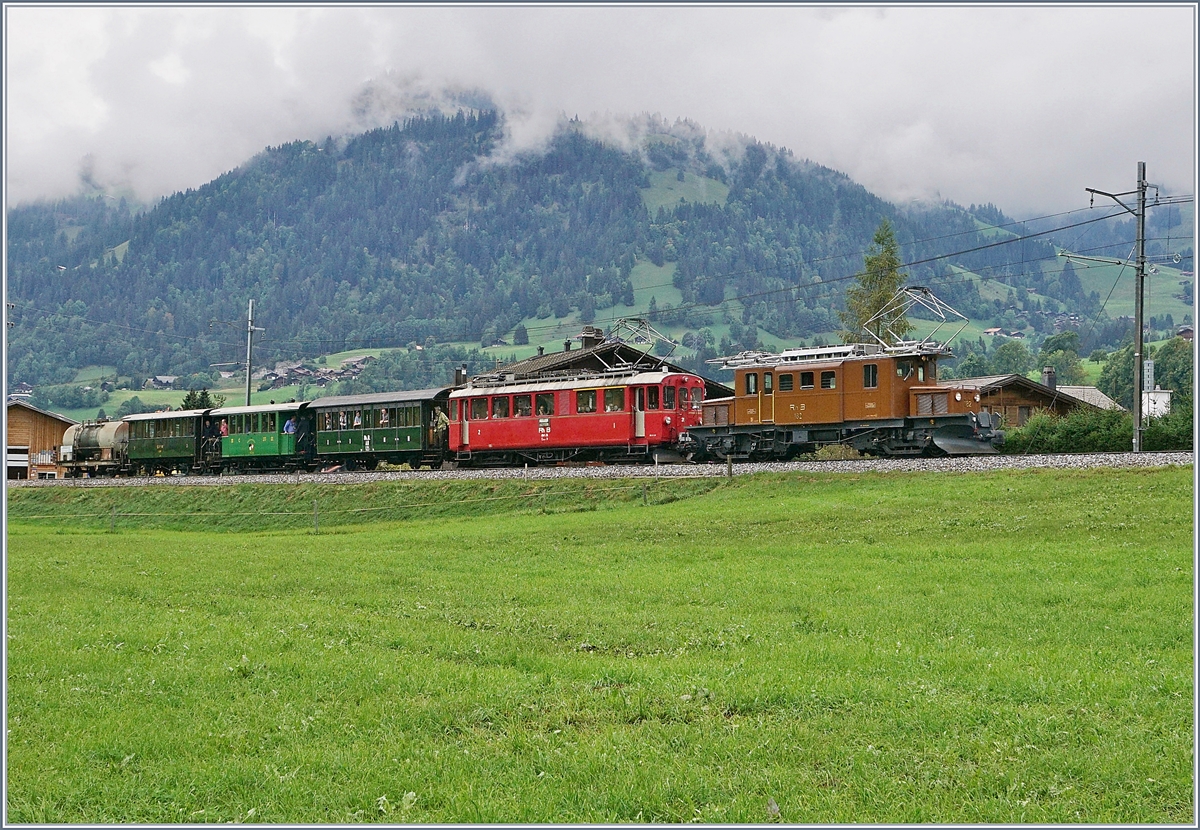 50 years Blonay -Chamby Railway - Mega Bernina Festival (MBF) wiht his Special Day Bündnertag im Saaneland: The RhB Ge 4/4 182 and ABe 4/4 35 with his Special Service from Bulle to Gstaad between Saanen and Gstaad.
14.09.2018
