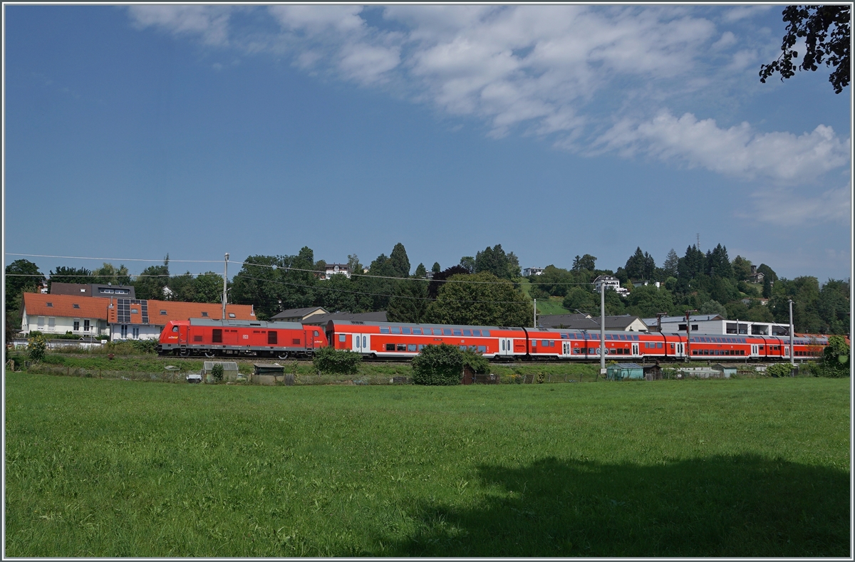 A DB 243 with his IRE on the way  from Lindau to Stuttgart in Enziweiler. 

14.08.2021