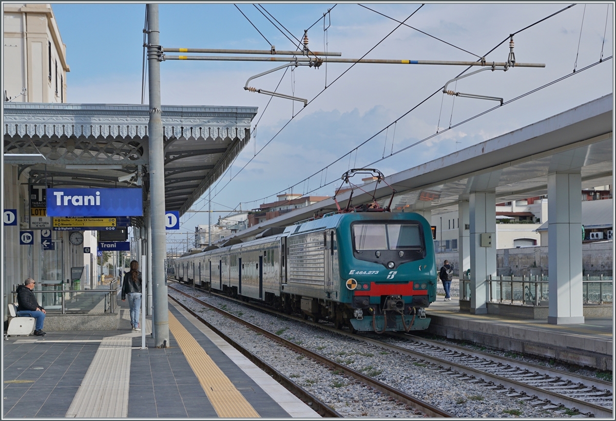 A FS Trenitalia regional train towards Bari stops in Trani. Despite the many new vehicles, older trains are still in use every now and then, such as this FS Tpy 73 low-floor train (Carrozza vicinale a piano ribassato) in XMPR livery with an npBD at the front and four nB cars as well as the pushing FS Trenitalia E 464 273.


April 20, 2023
