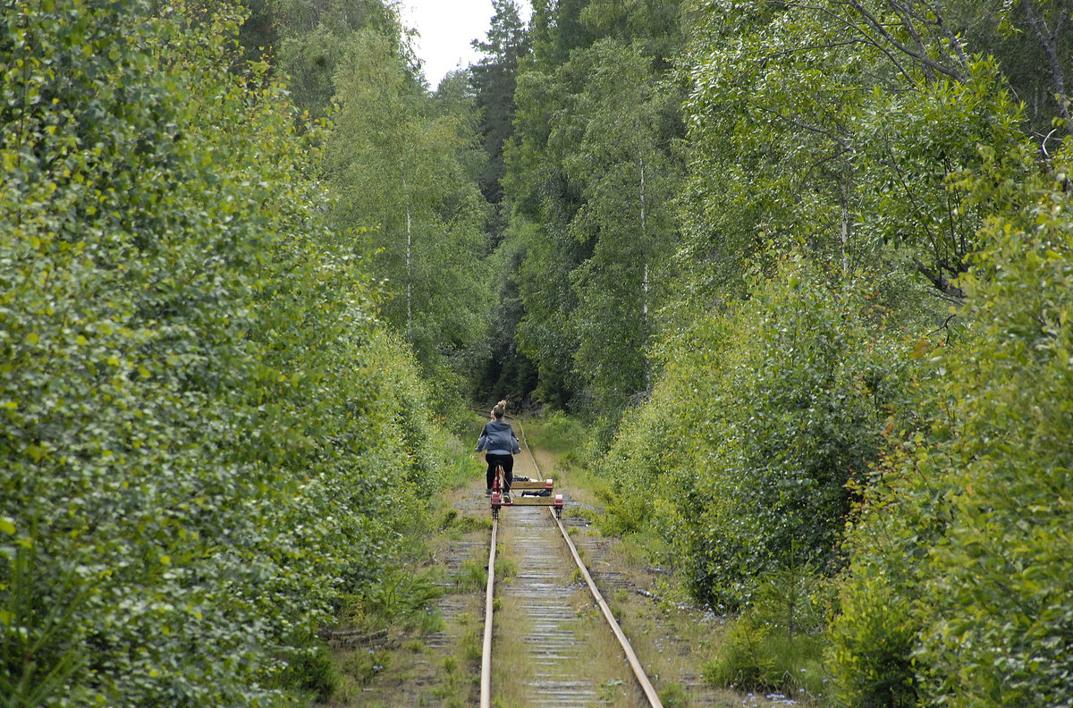 A photo from a drain trip on the narrow gauge railway from Åseda to Virserum in Sweden. The line passes dense forest and beautiful scenery with remote lakes. Date: 18. July 2017.