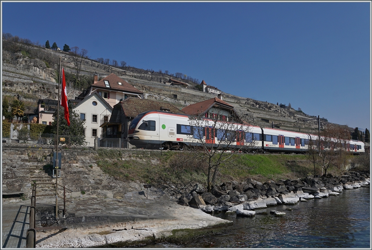 A SBB RABe 523 by St Saphorin on the way to Lausanne. 

25.03.2022