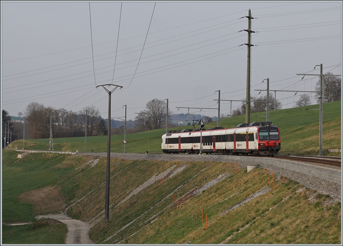 A SBB RBDe 560 Domino by the TPF on the way from Neuchâtel to Romont by Pensier. 

29.03.2022