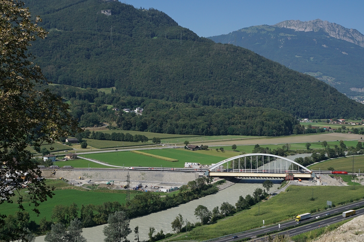 A SBB Re 460 with an IR on the new Bridge over the Rhone between Bex and St Maurice. 26.08.2016