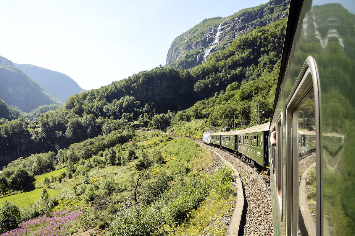 A view from a train on the Flåm Railway line. This train is heading for Myrdal Station on the oslo-Bergen railway. Date: 13 July 2018.