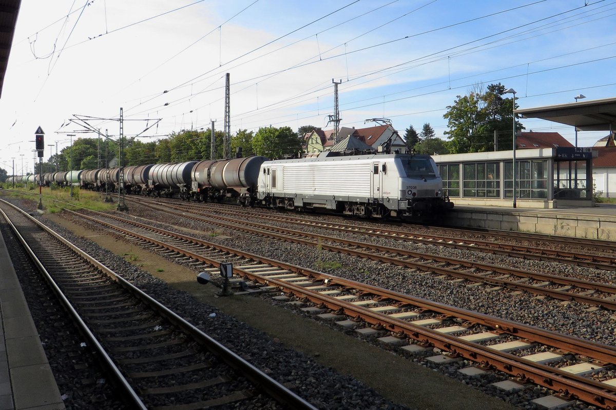 Akiem 37038 hauls a tank train through Angermünde on 19 September 2020.
