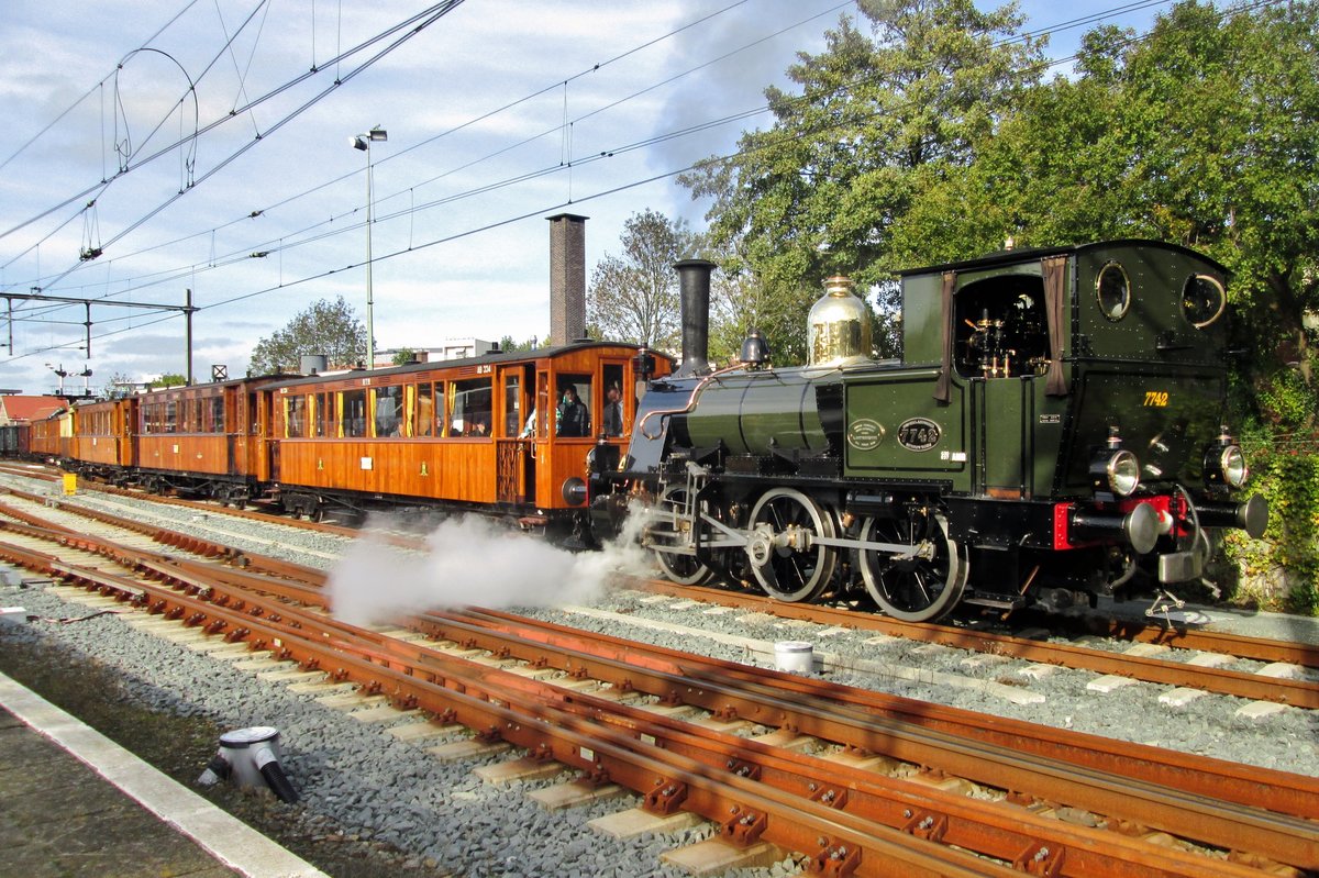 BELLO (7742) hauls a steam tram to Medemblik out of Hoorn on 25 October 2015.
