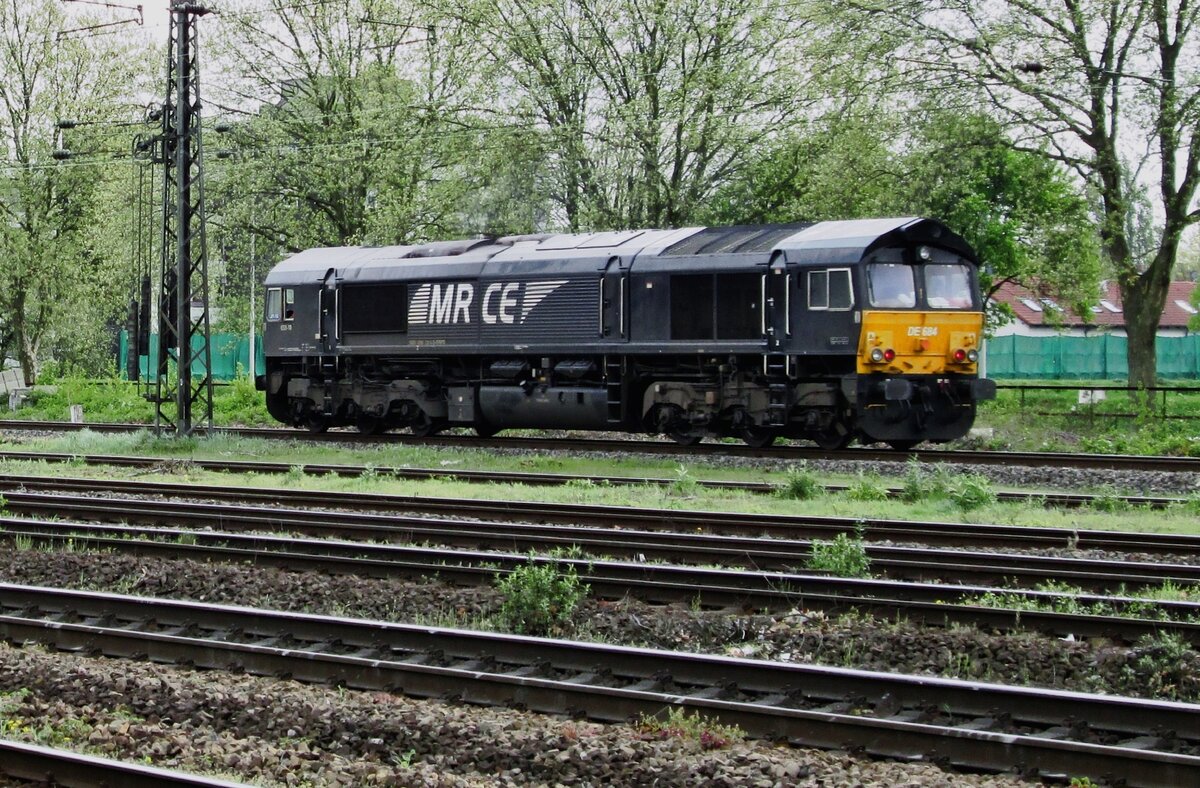 Black, but with large MRCE markings: HGK DE 684 runs light through Oberhausen Osterfeld-Süd on 9 April 2014.