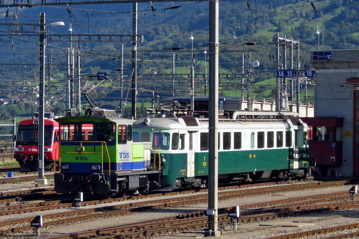 BLS 245 022 shunts an old electric railcar into the BLS works at Spiez on 13 September 2011.