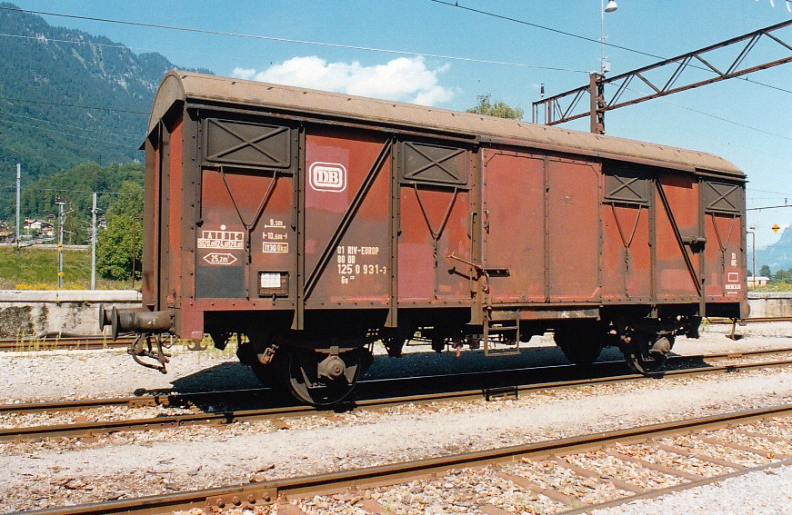 DB RIV-EUROP Covered Wagon Gs near station Interlaken-Ost (CH), August 1993