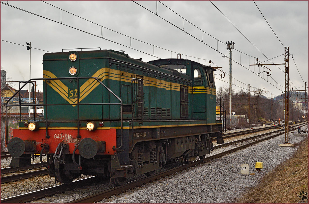 Diesel loc 643-014 run through Maribor-Tabor on the way to Tezno yard. /2.3.2015
