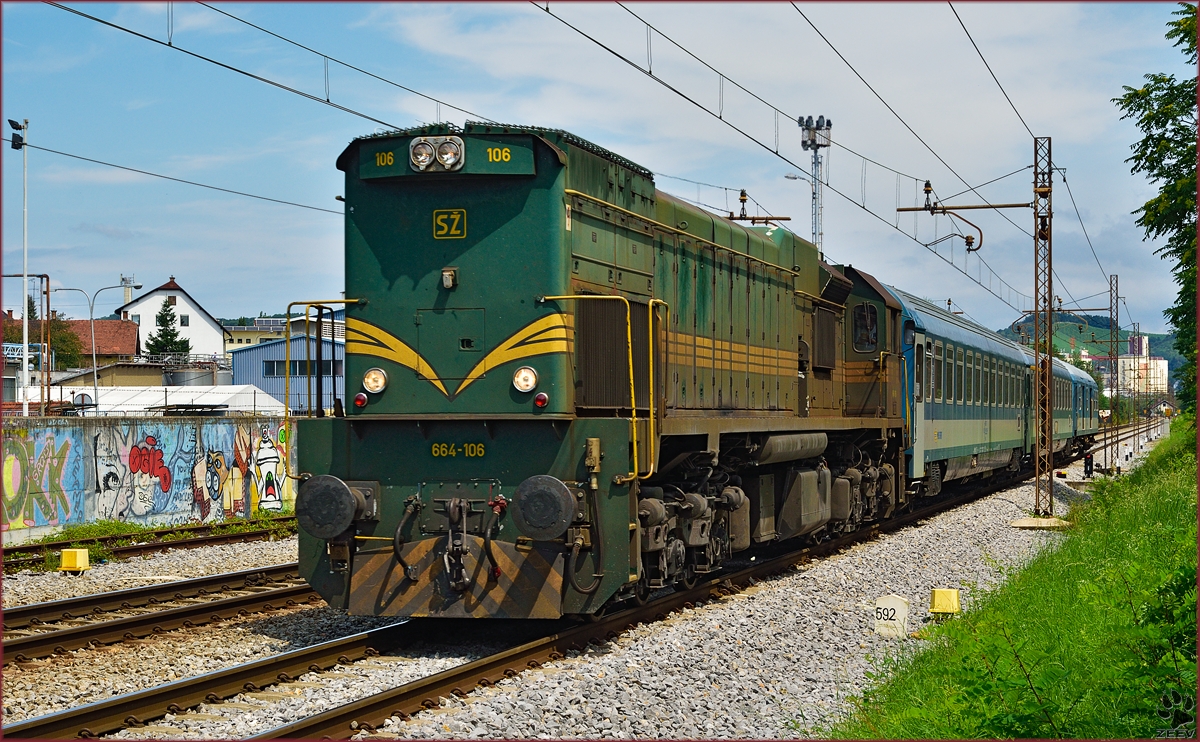 Diesel loc 664-106 pull MV247 'Citadella' through Maribor-Tabor on the way to Budapest. /1.8.2014