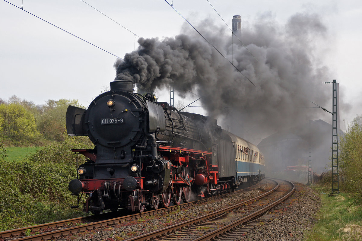 DR series 01.10 Locomotive 011 075-9 on April 19, 2015 in Essen in front of the Zeche Wohlverwahrt.