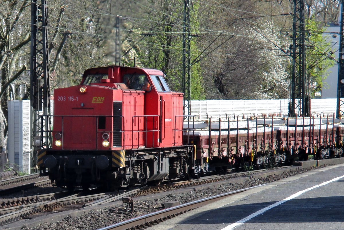 EBM Cargo 203 115 hauls a steel train through Köln Süd on 30 March 2017.