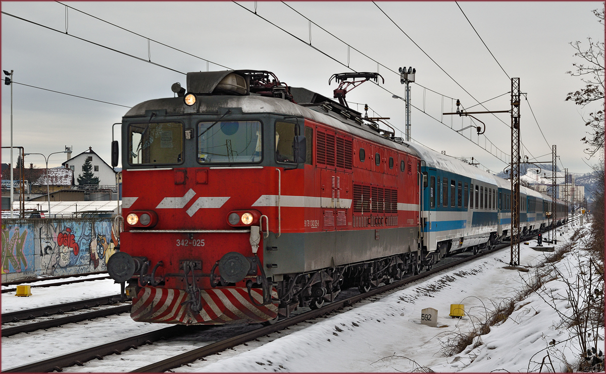 Electric loc 342-025 pull EC151 'Emona' through Maribor-Tabor on the way to Ljubljana. /10.2.2015