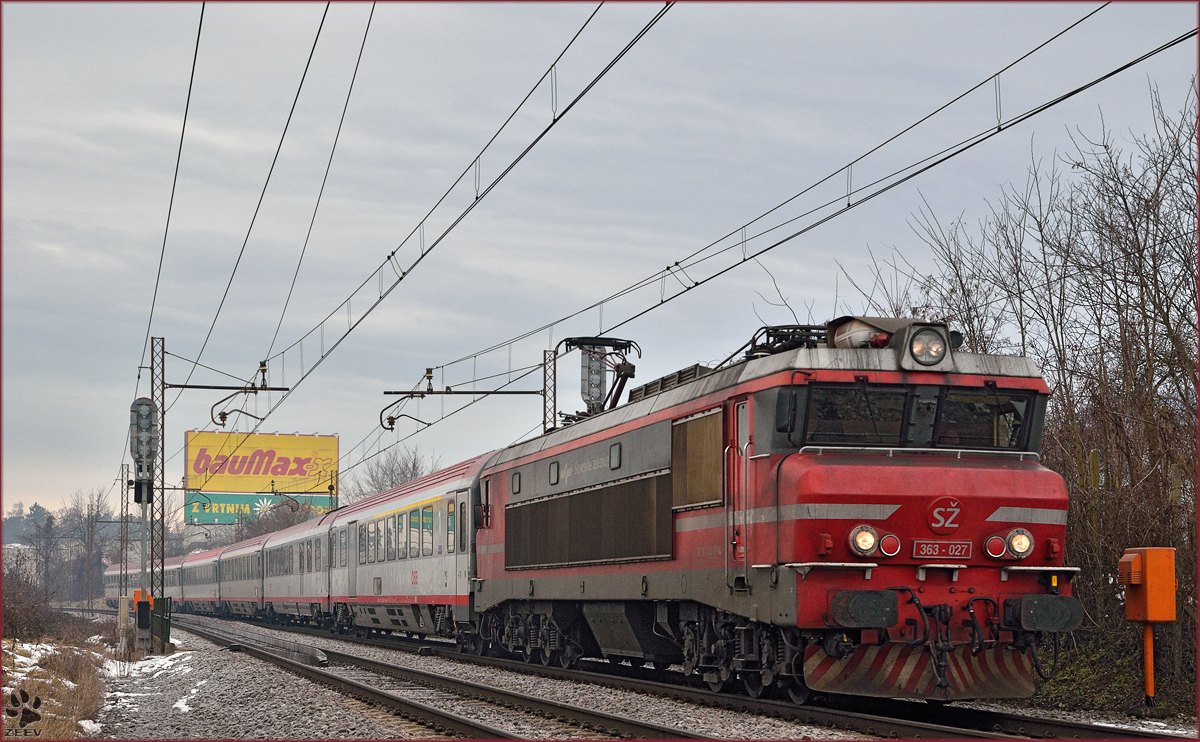 Electric loc 363-027 pull EC158 'Croatia' through Maribor-Tabor on the way to Vienna. /9.1.2015