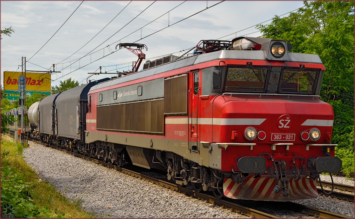 Electric loc 363-031 is pulling freight train through Maribor-Tabor on the way to the north. /16.6.2014