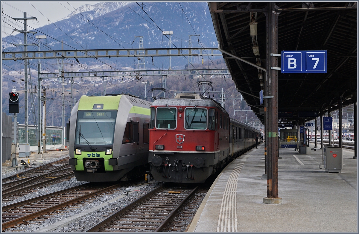 From an to Domodossola: The RABe 535 103 is comming from Domodossola, and the Re 4/4 II 1138 is coing to Domodossola. The pikture was tool in Brig.
07.01.2016