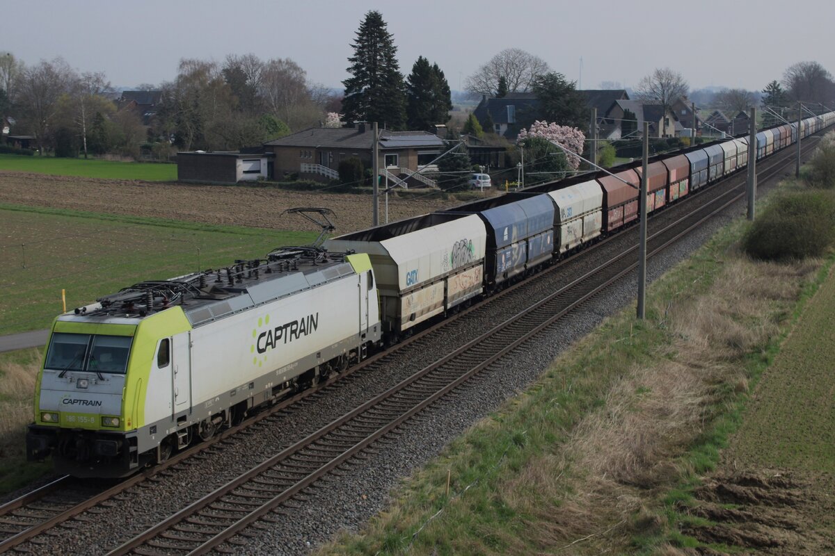 From Bottrop, Captrain 186 155 hauls a coal train bound for Amsterdam-Westhaven near Praest on 20 march 2024.
