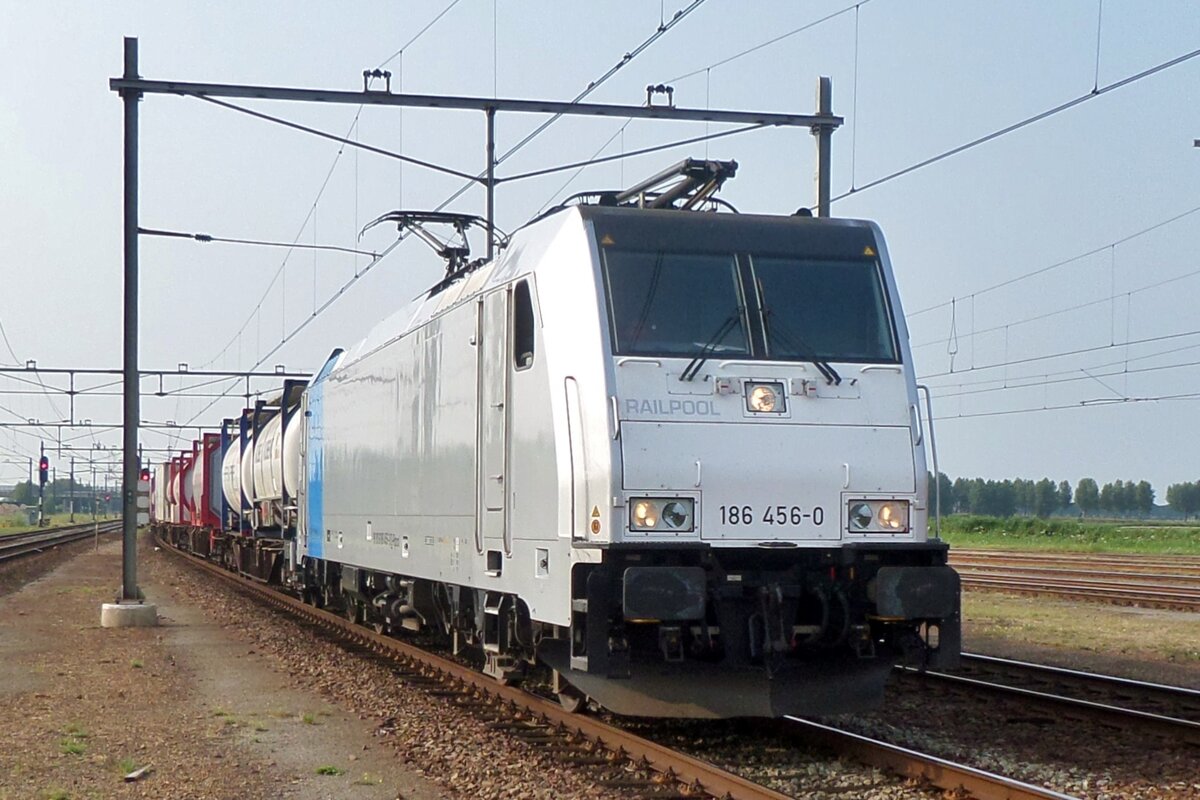 From the platform at Lage Zwaluwe, Railkpool 186 456 with container train to Venlo was seen on 16 July 2016.