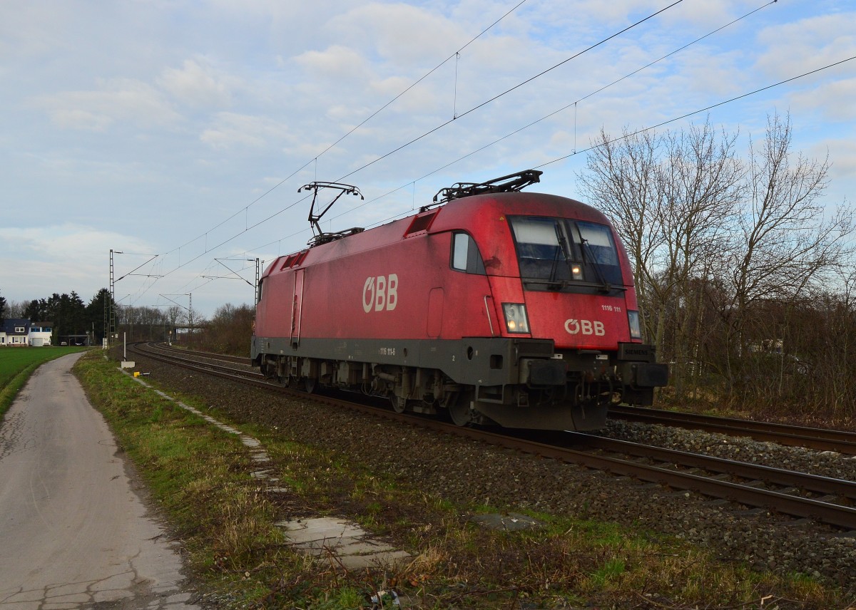 Lonerider is this austrian class 1116 111 at the midday hours on the tracks to Neuss. Here we see the locomitive near Kaarst Broicherseite on Saturday 19th. of decembre 2015
