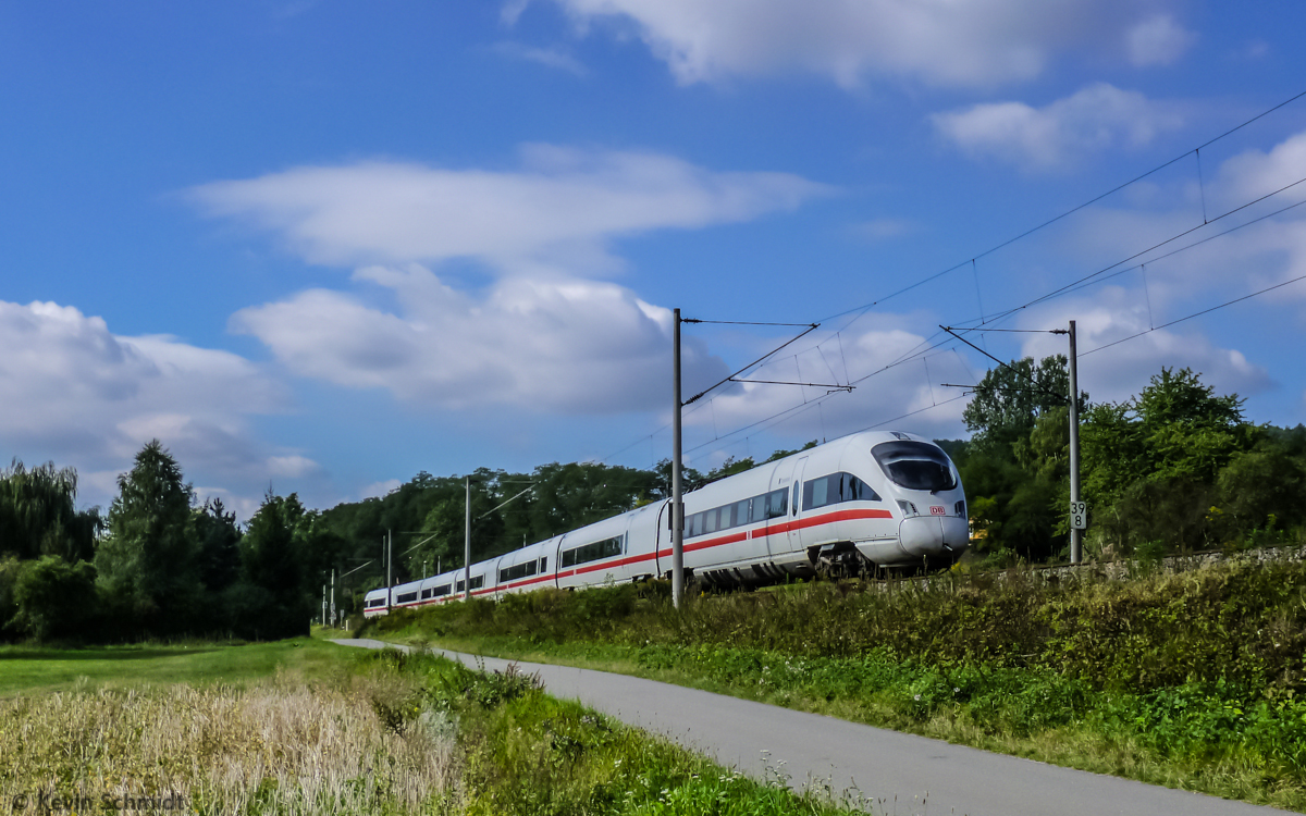 Long distance train ICE 1512 from Munich to Hamburg is on the ride through the Saale river valley near Kahla and will soon reach its next stop at Jena Paradies. (8 September 2012)