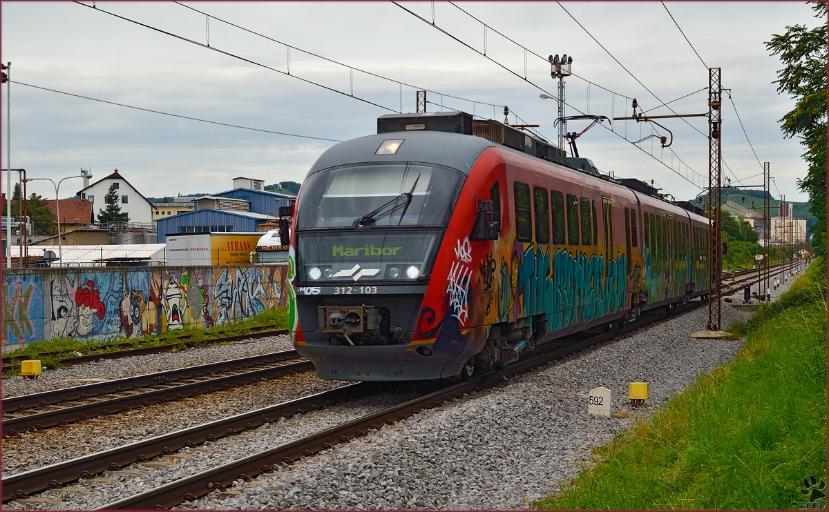 Multiple units 312-103 run through Maribor-Tabor on the way to Zidani Most. /8.7.2014