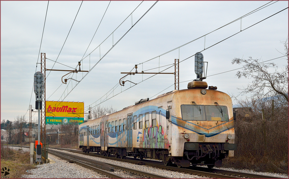 Multiple units 813-130 are running through Maribor-Tabor on the way to Maribor station. /20.2.2014