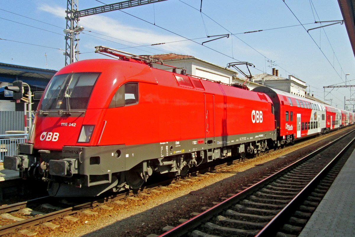 ÖBB 1116 042 stands with a regional expres train in Breclav on 2 June 2015.