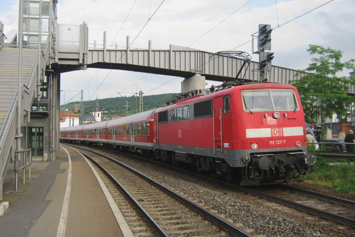 On 1 June 2012 DB Regio 111 127 pushes a regional train to Mainz Hbf out of Bingen (Rheinland). 