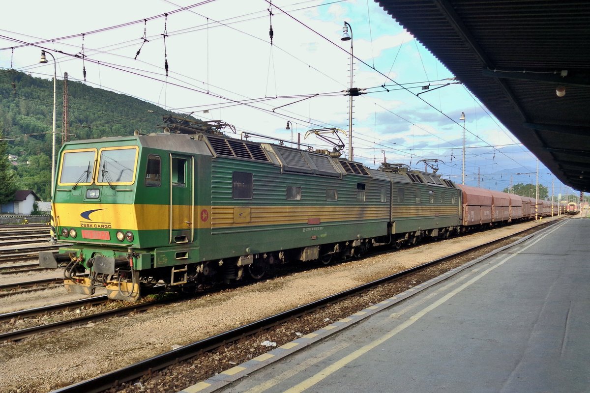 On 29 May 2015 ZSSK 131 007 stands with a coal train at Zilina.