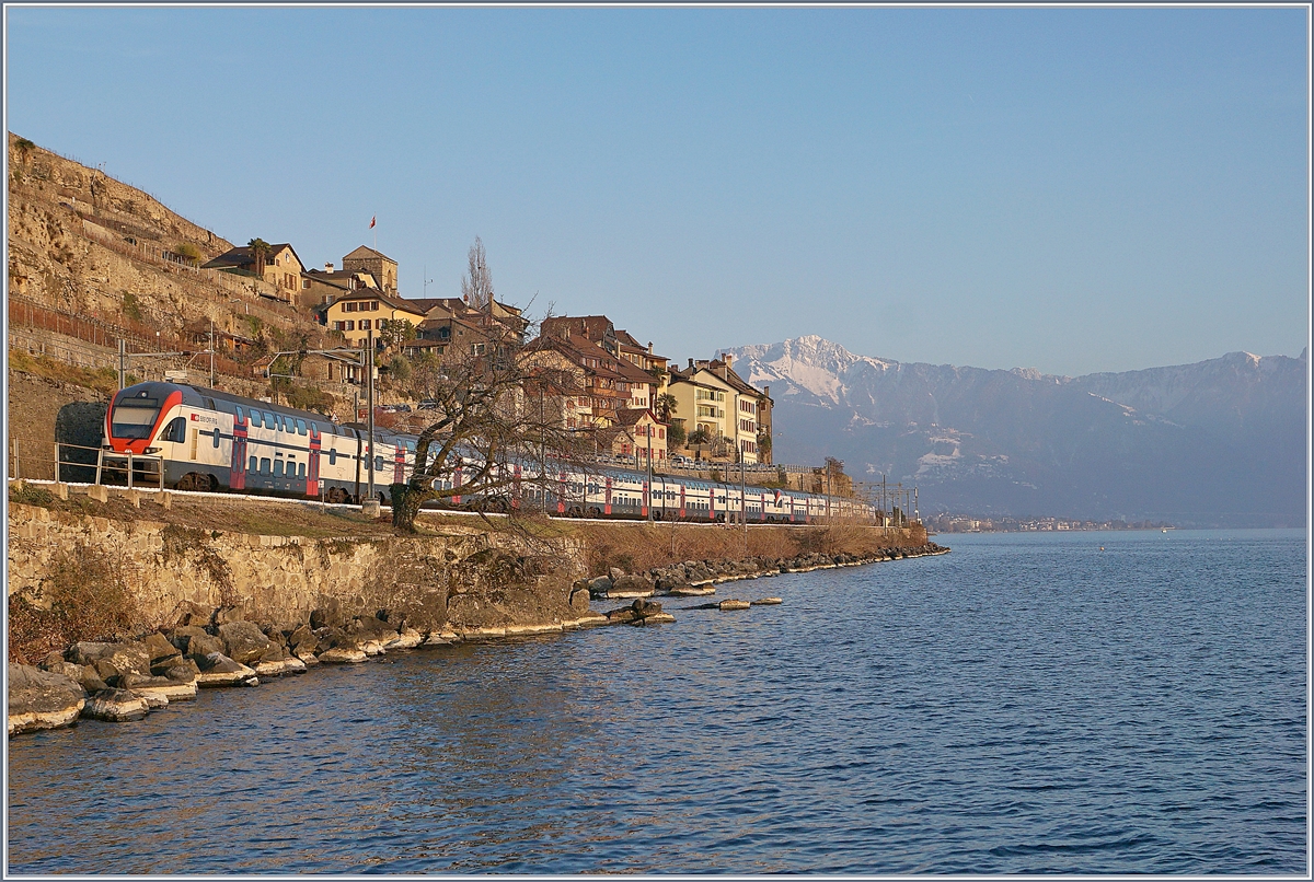 On a winter after noon are runing two RABe 511 by St Saphorin on the way to Vevey. 
25.01.2019