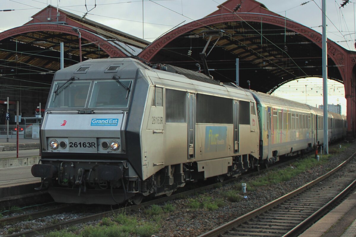 On the evening of 12 February 2024 SNCF 26163 hauls a TER to Paris out of Strasbourg Gare Central. Where the faster TGV takes a bit more than one hour between Paris and Strasbourg, the slower TER services take five hours between the two cities, albeit passing through a more varied landscape.