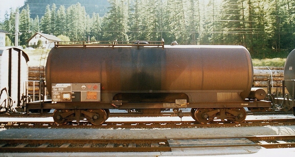 Rhaetian Railway - Tank wagon Uah 8131 with equalizer bogies (trucks) in station Pontresina, August 1987. During the 1980s the whole series 8131-8140 was retrofitted with standard design bogies. In 1996/1997 the tanks were upgraded to funnel flow design 