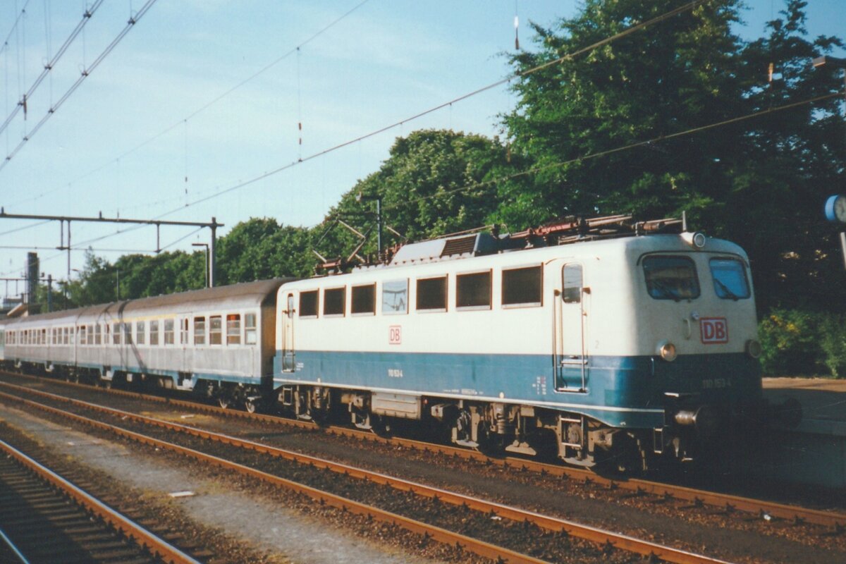 Scanned photo of DB 110 153 with a stopping train at Venlo on 4 July 1999.