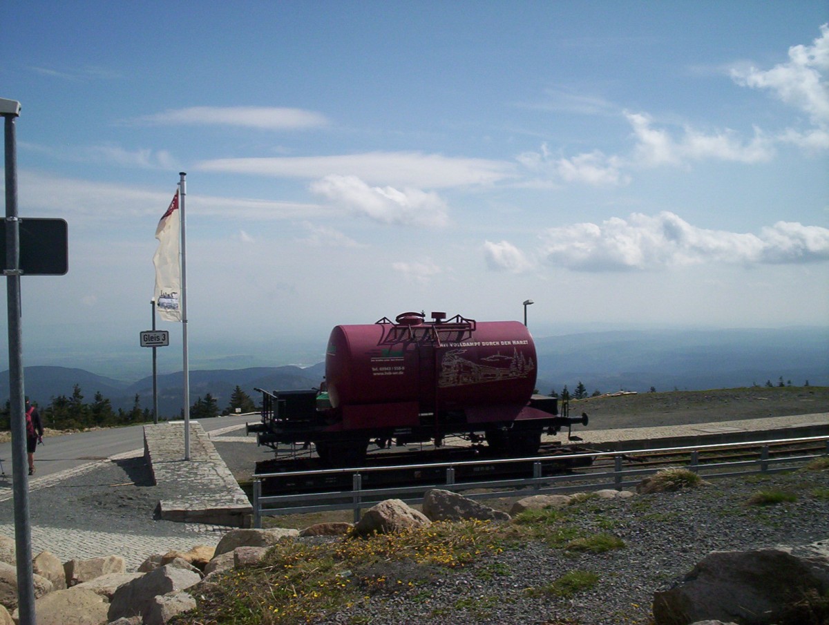 Standard guage HSB advertisement Tanker (Probably also serves as makeshift water fe-filling-point) on a re-gauging wagon, Brocken, May 2013.