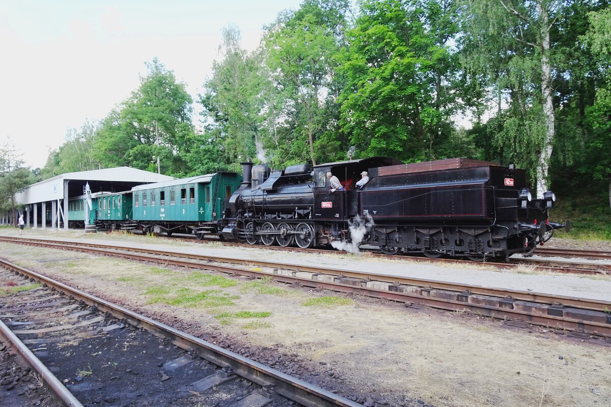 Steam loco 414 096 HELICON was restored in time for the 25th anniversary of the Railway Museum at Luzna u Rakovnika and pulls a steam shuttle train in the museum area on 11 June 2022.