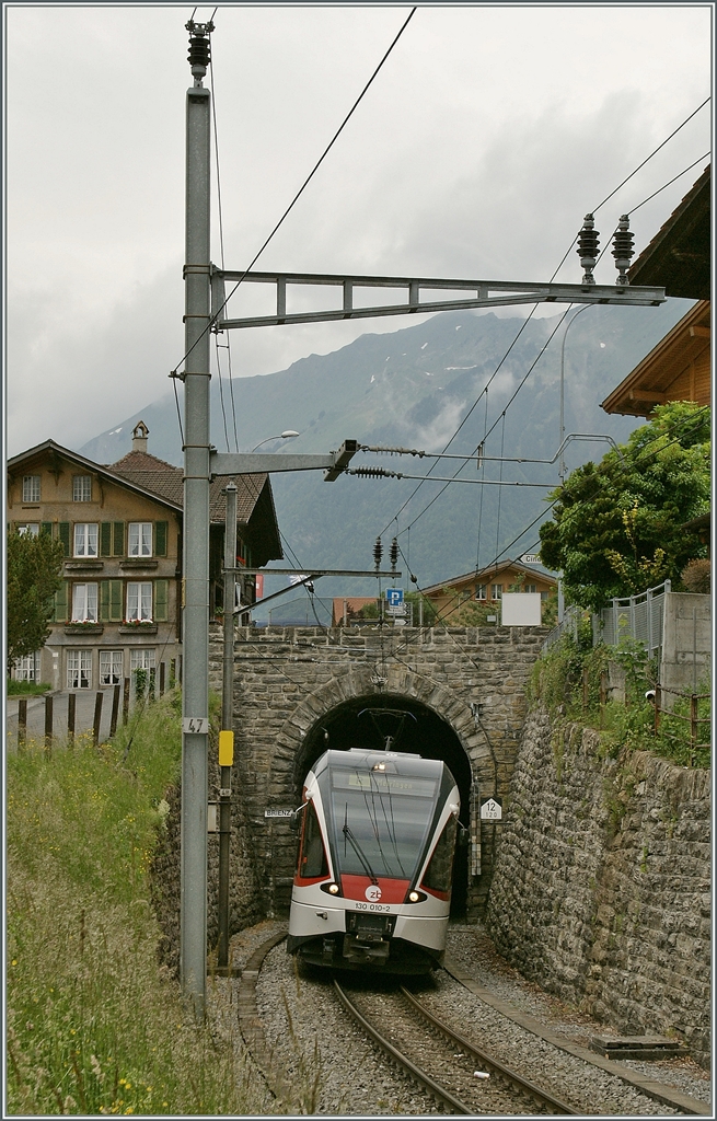 The 130 010-2 on the way to Meiringen is arriving at Brienz. 
01.06.2012