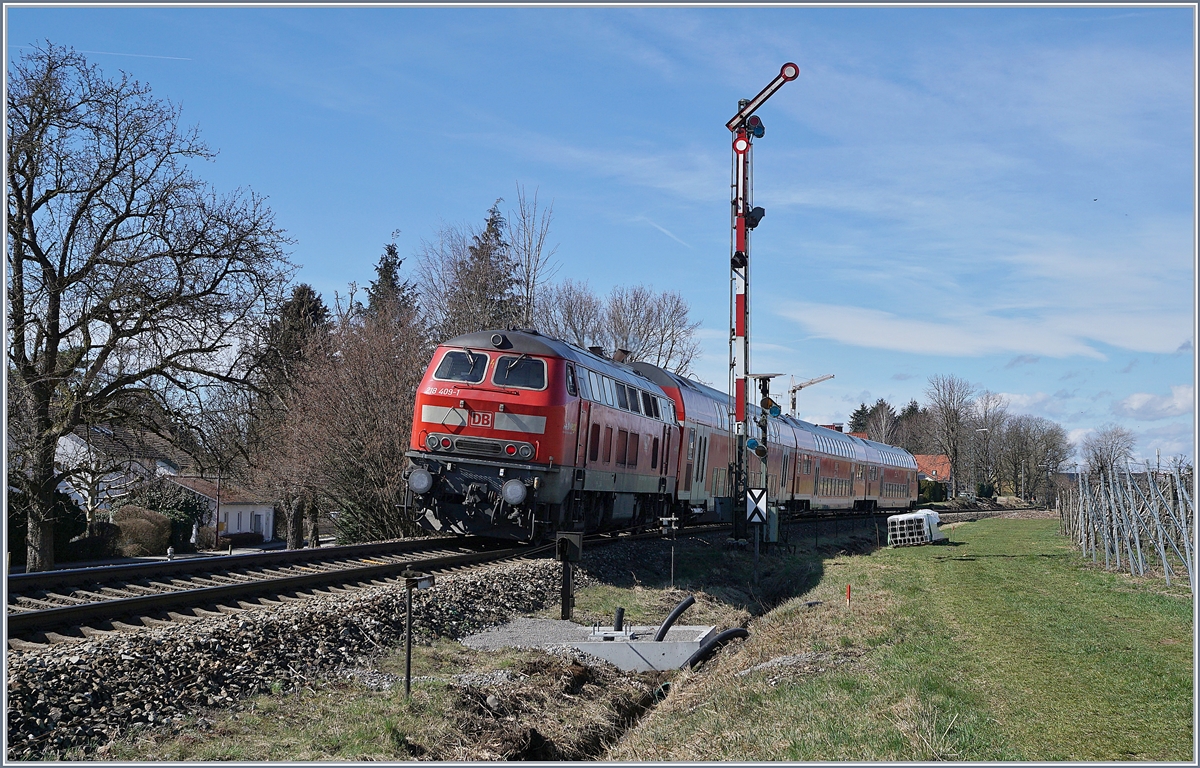 The DB 218 409-1 with a RE to Aulendorf by Nonnenhorn.

16.03.2019