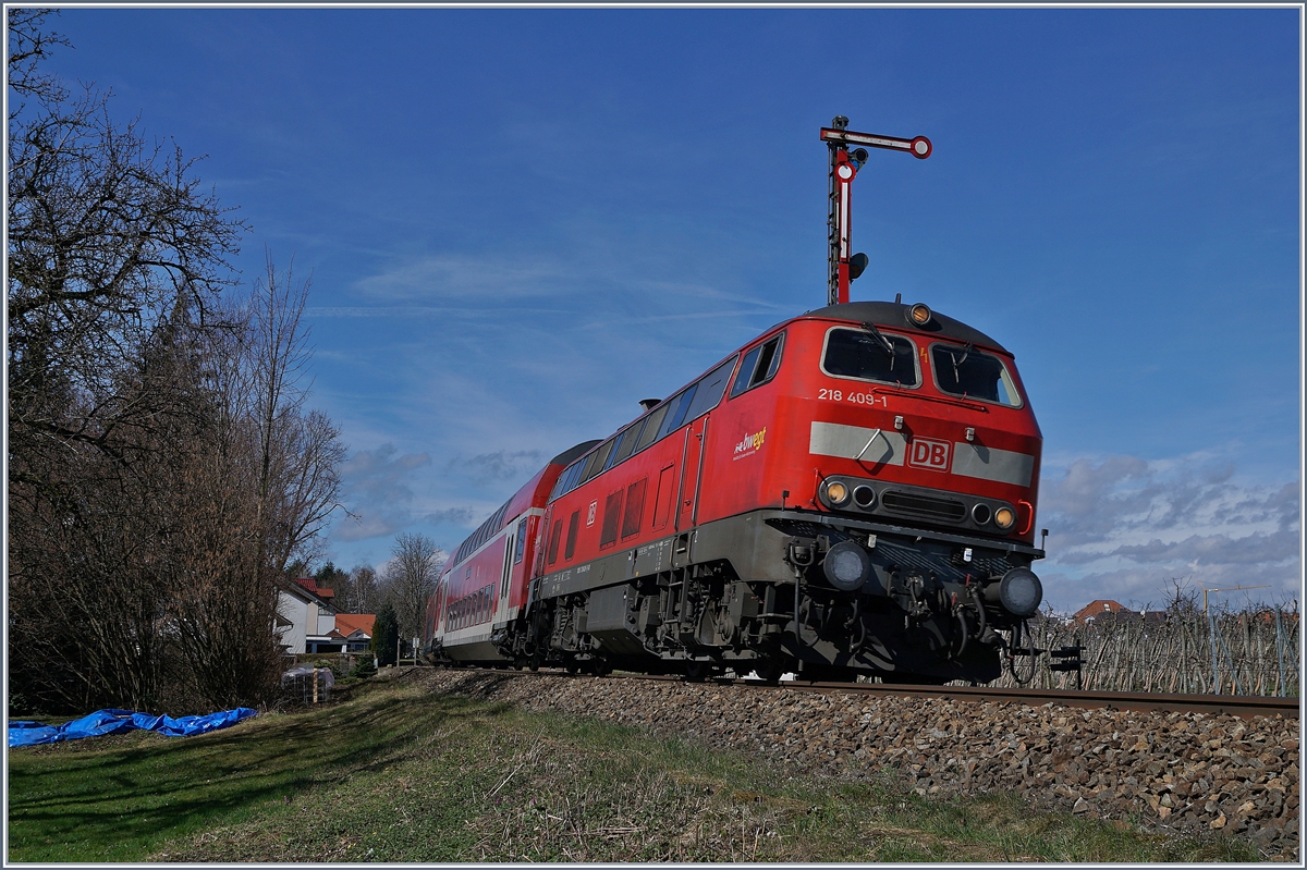 The DB V 218 409-1 wiht a RE to Lindau by Nonnenhorn.

16.03.2019