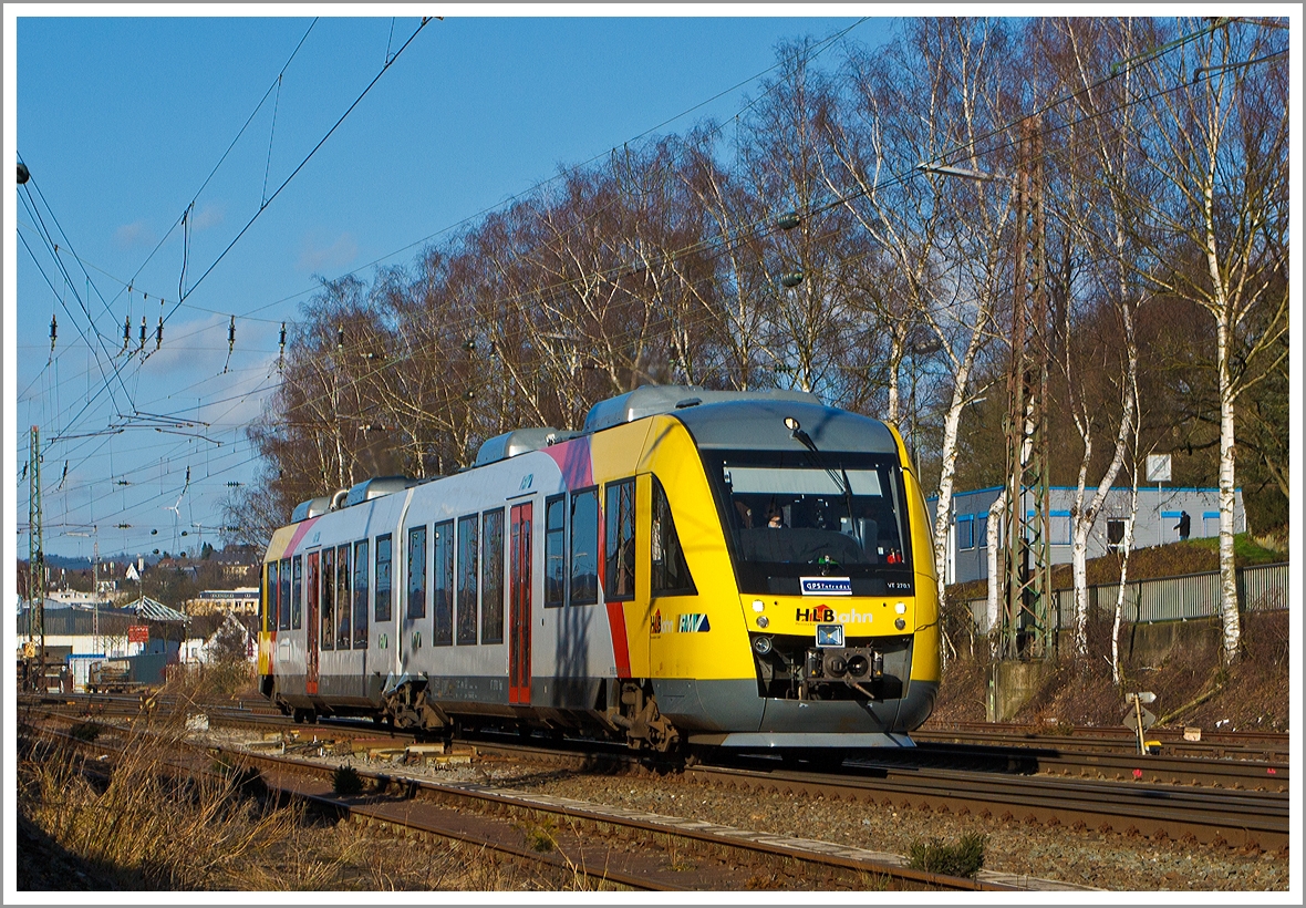 The diesel railcar VT 270 a Alstom Coradia LINT 41 of the HLB (Hessian State Railways) as RB 93 (Rothaarbahn) Bad Berleburg - Kreuztal - Siegen moves on 02.02.2014 at Kreuztal in the direction of Siegen.