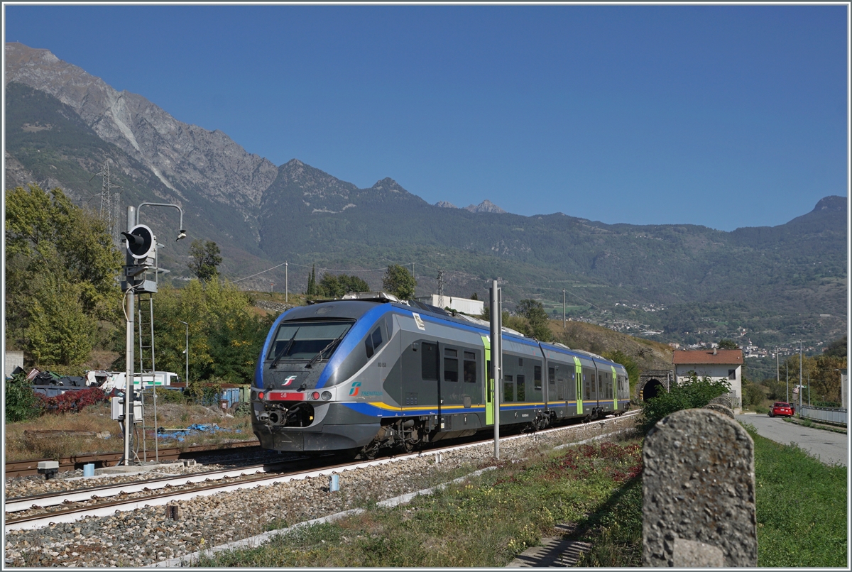 The FS Trenitalia Minuetto MD Aln 501 018 leaves Chatillon Saint Vincent Station. The train is on the way from Aosta to Ivrea.

Oct 11, 2023