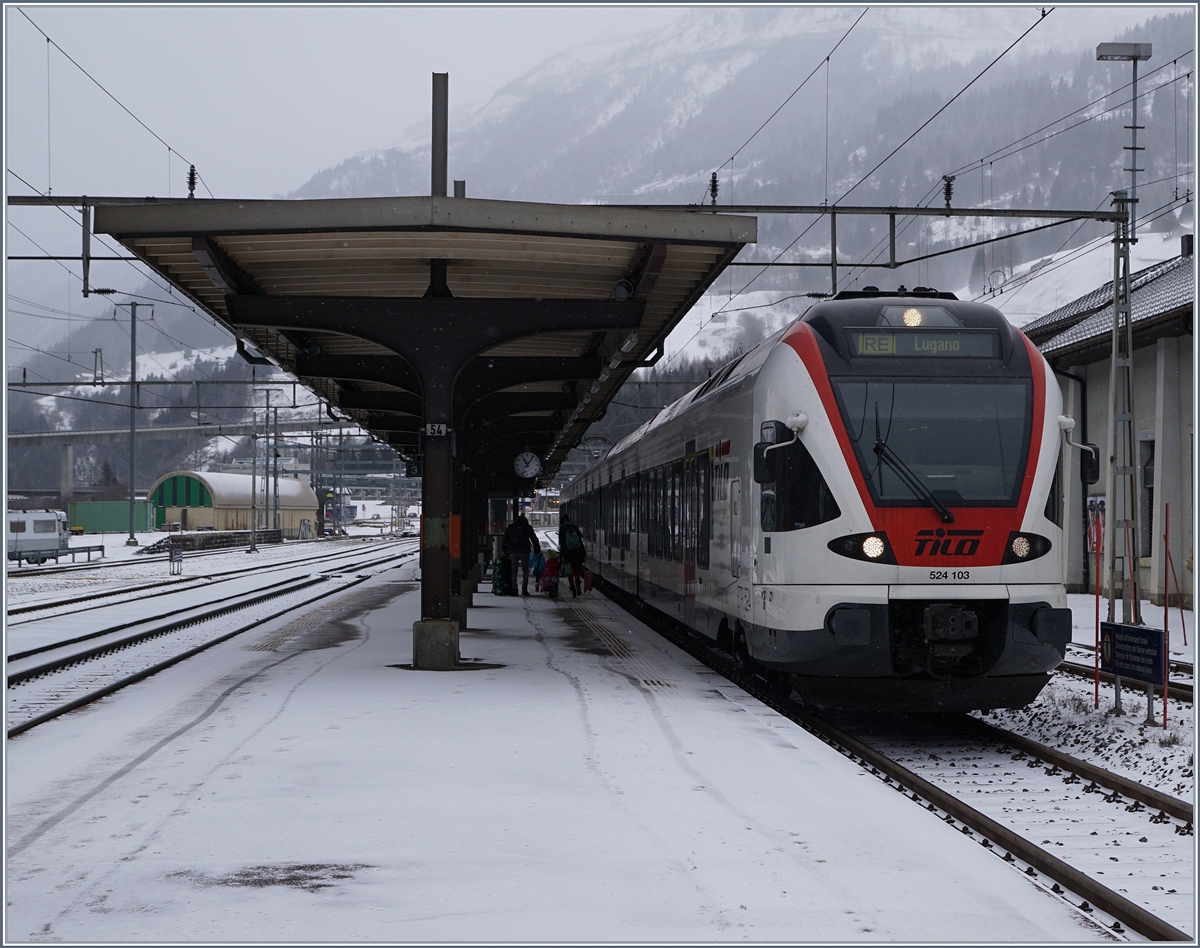 The SBB FFS Tilo RABe 524 103 from Erstfeld to Lugano by his stop in Airolo.
05.01.2017