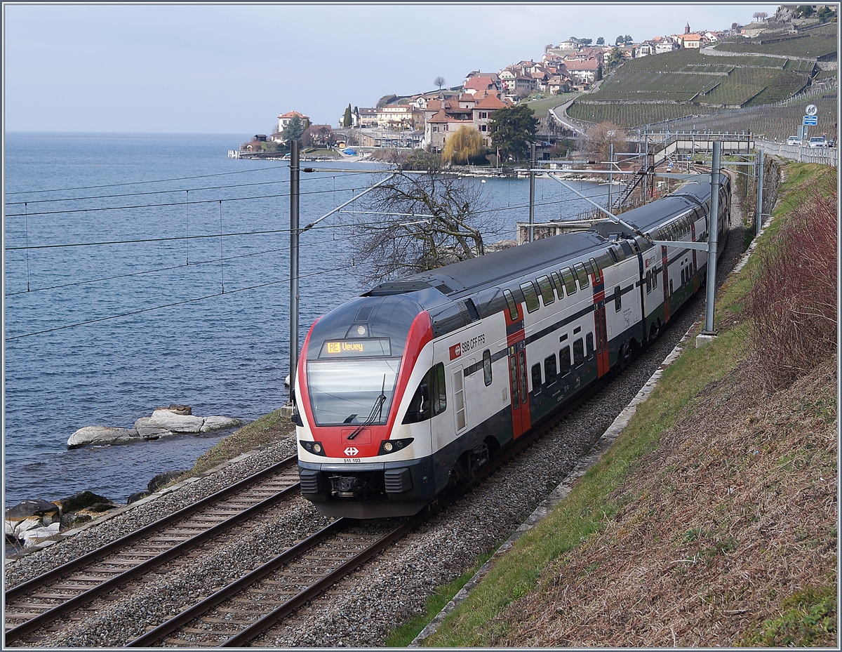 The SBB RABe 511 103 to Vevey by St Saphorin.
18.03.2018