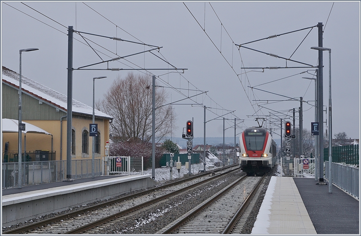 The SBB RABe 522 206 on the way from Meroux TGV to Biel/Bienne is arriving at the new Grandvillars Station.
 11.01.2019