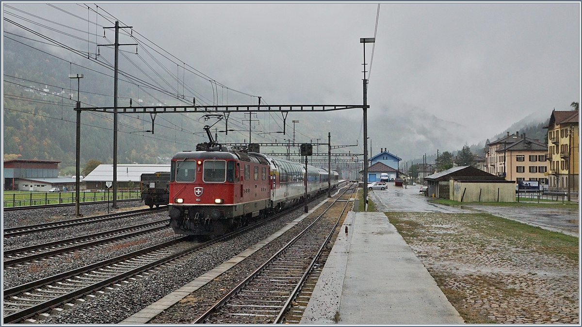 The SBB Re 4/4 11159 with the Gotthard Panorama Express from Lugano to Flüelen (with a boat Connection to Luzern) in Ambri Piotta.

19.10.2019